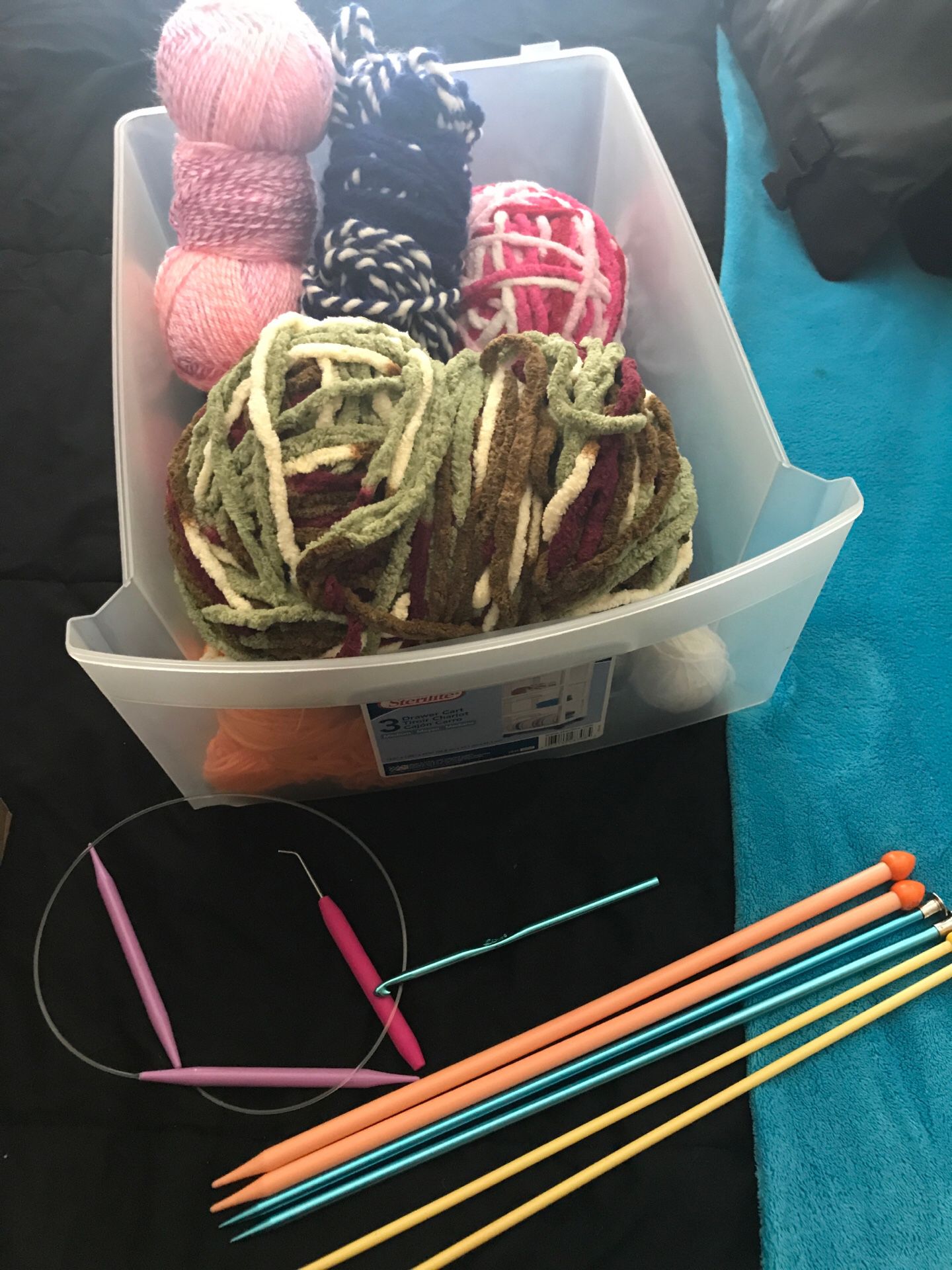 Assorted yarn and needles