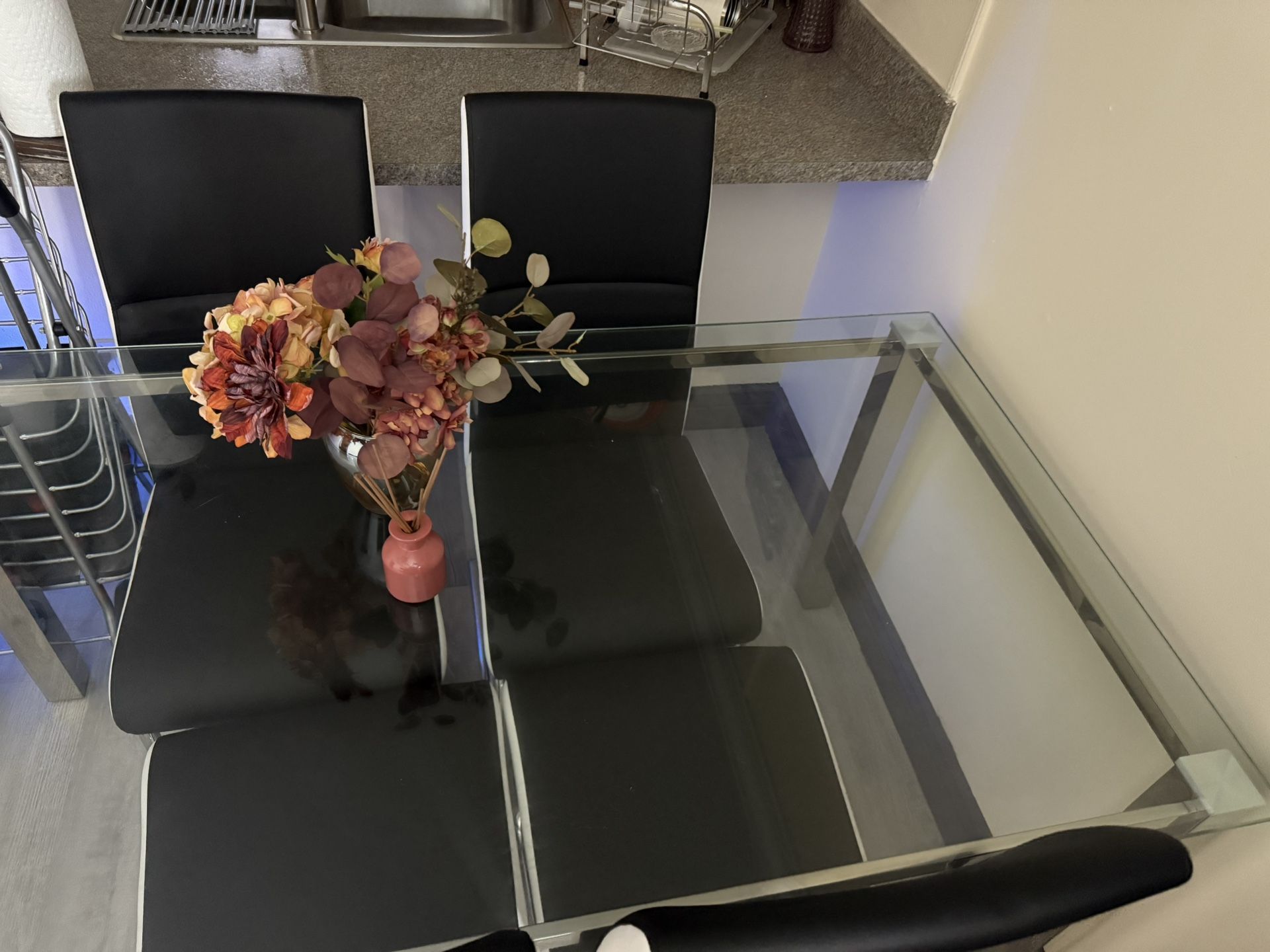 Glass Dining Table with 4 Black & White Chairs – Modern Design