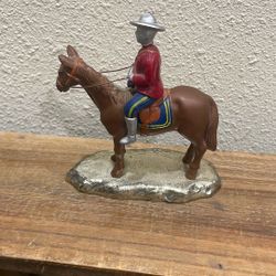 Small Vintage Military Man On A Horse.