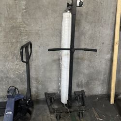 Warehouse portable stretch wrapper & pallet of wrap