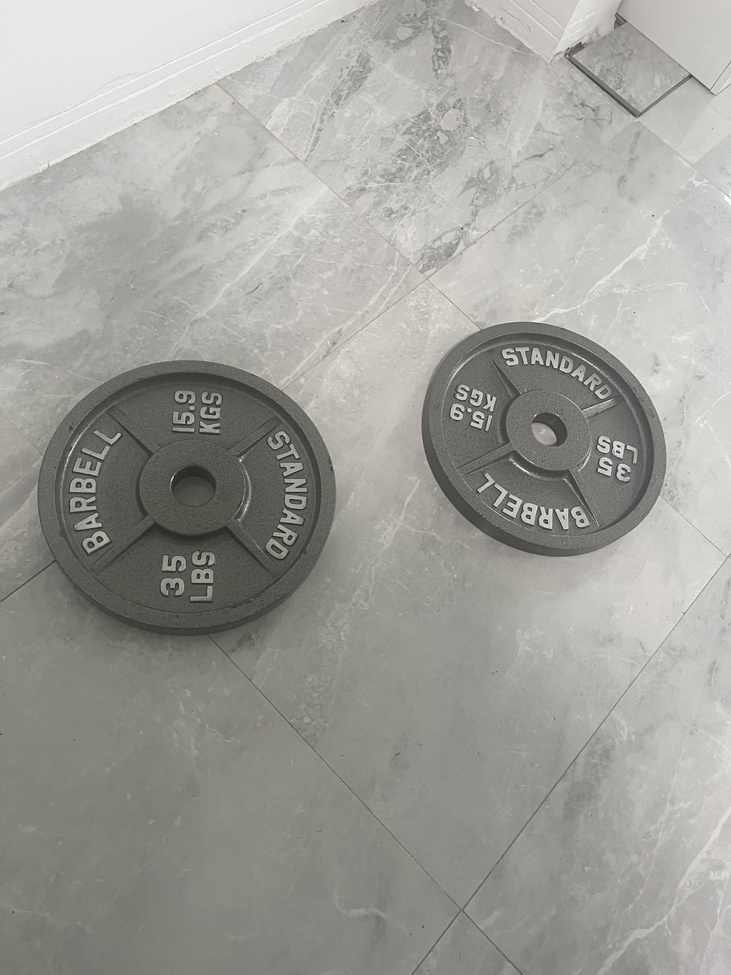 Like New Pair Of 35lb Olympic Weights Plates Total 70lb
