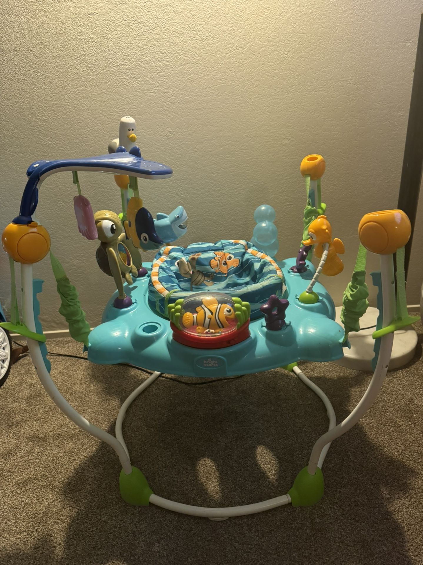 BRIGHT STARTS Vibrant Disney Baby Finding Nemo Activity Center Jumper $40 Dlls
