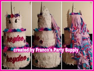 Unicorn piñata cake
