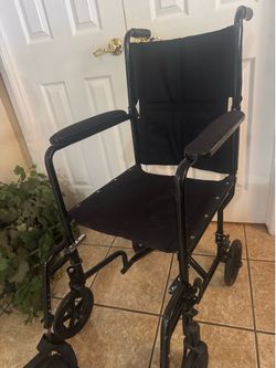 Medical transport chair. Folds quick , easily  & compact.