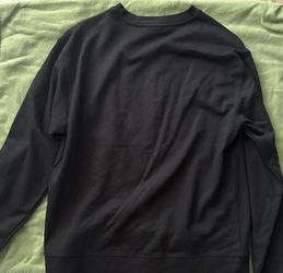Black crewneck sweatshirt