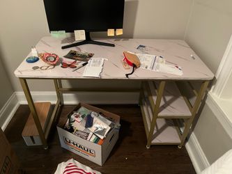 Desk with gold legs and faux marble top