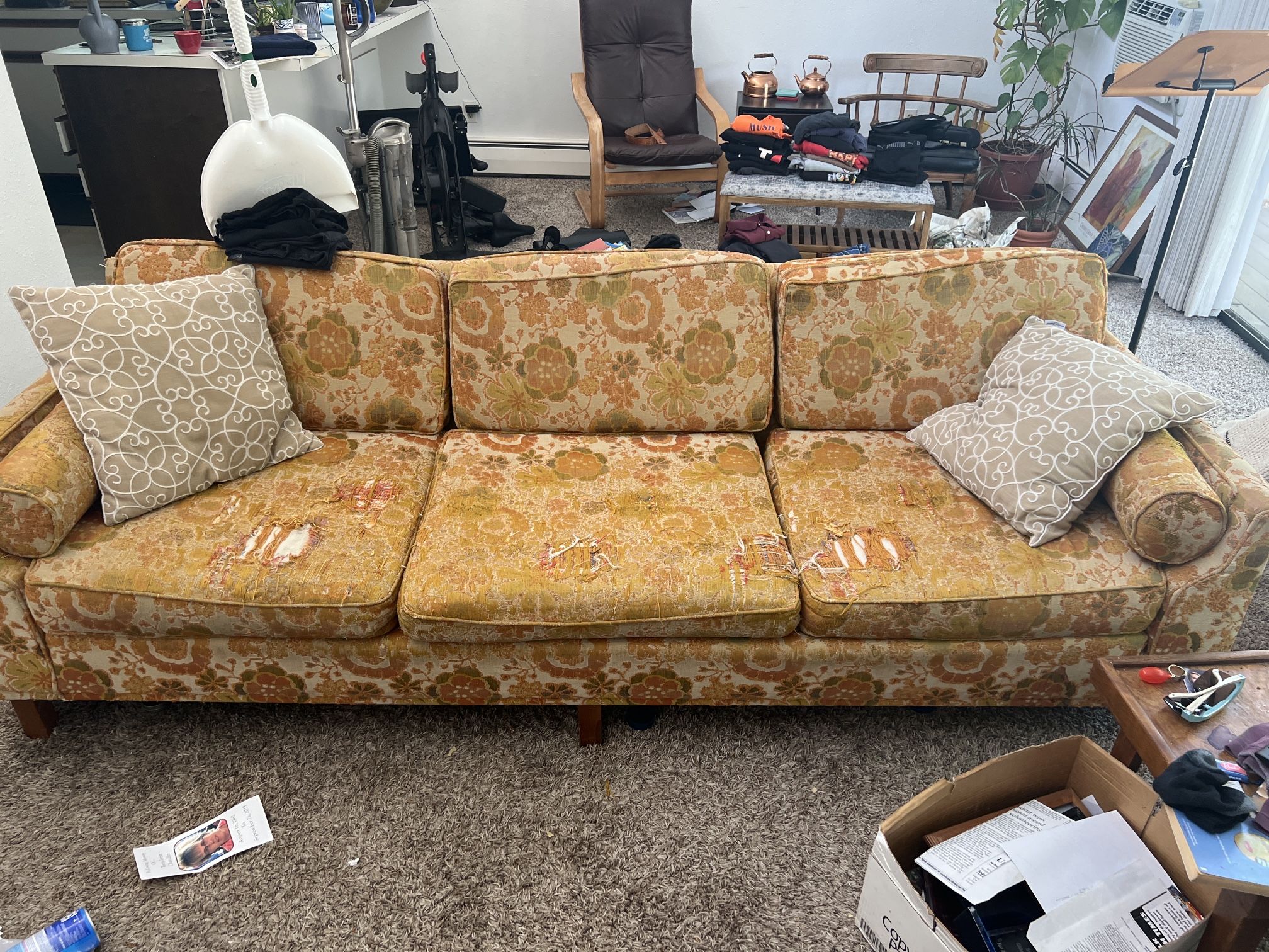 Well-worn Vintage Floral Couch.