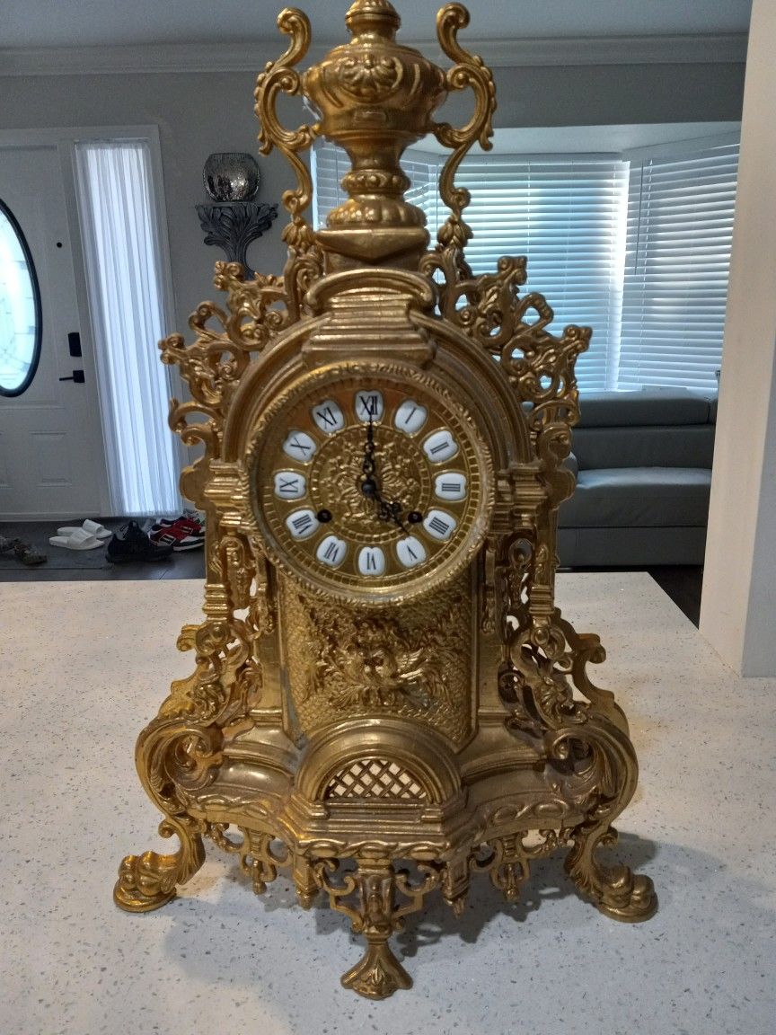 ANTIQUE BRASS CLOCK
