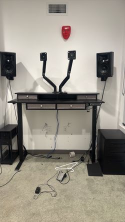 Black Standing Desk with Dual Monitor Arms