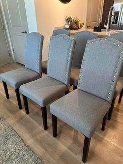 Six Matching Tufted Dining Chairs