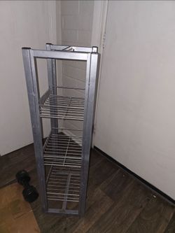 Metal standing shelf