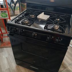 Estufa De Gas GE  NEGRA 30 PULGADAS DE ANCHO