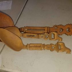 Intricate hand carved wooden ladels/spoons with horse and heart details in handle. A112Z417