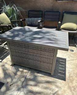 Patio fire pit table