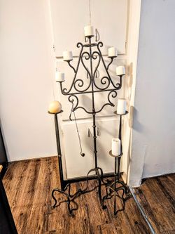 20th-century floor wrought iron candle holders.