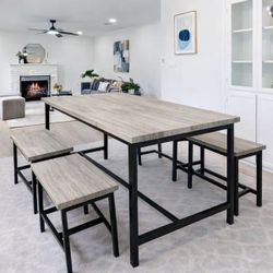 Grey wood-look top with black metal frame and legs