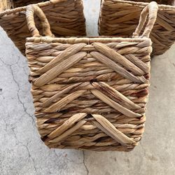  3 woven wicker storage baskets. 