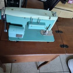Vintage Sewing Machine. By White . With Cabinet Table 