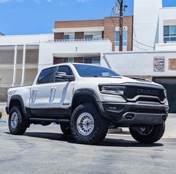 Eibach Front and Rear Level Springs with 18” Kmc Machined + 37’s Toyo RT Trails