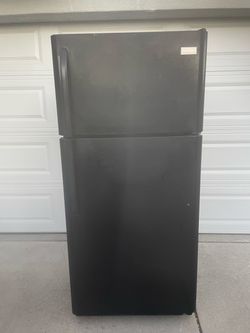 Frigidaire top and bottom refrigerator for $190. Dimensions are 30Wx30Dx66H. Pick up only.