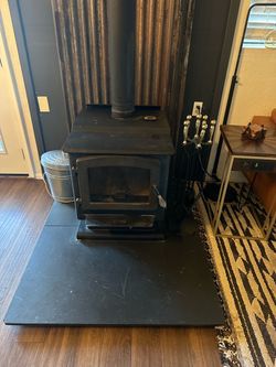 Wood stove with stack pipe