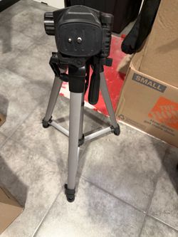 Camera tripod with bag