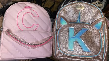 Both New Small Justice Back Packs 