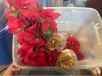 Lot of new old stock artificial poinsettia bunches and gold pine cone bunches.