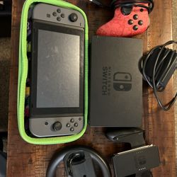 Nintendo Switch Comes with Charger, Case, Controller, And Games Of  Your Choice