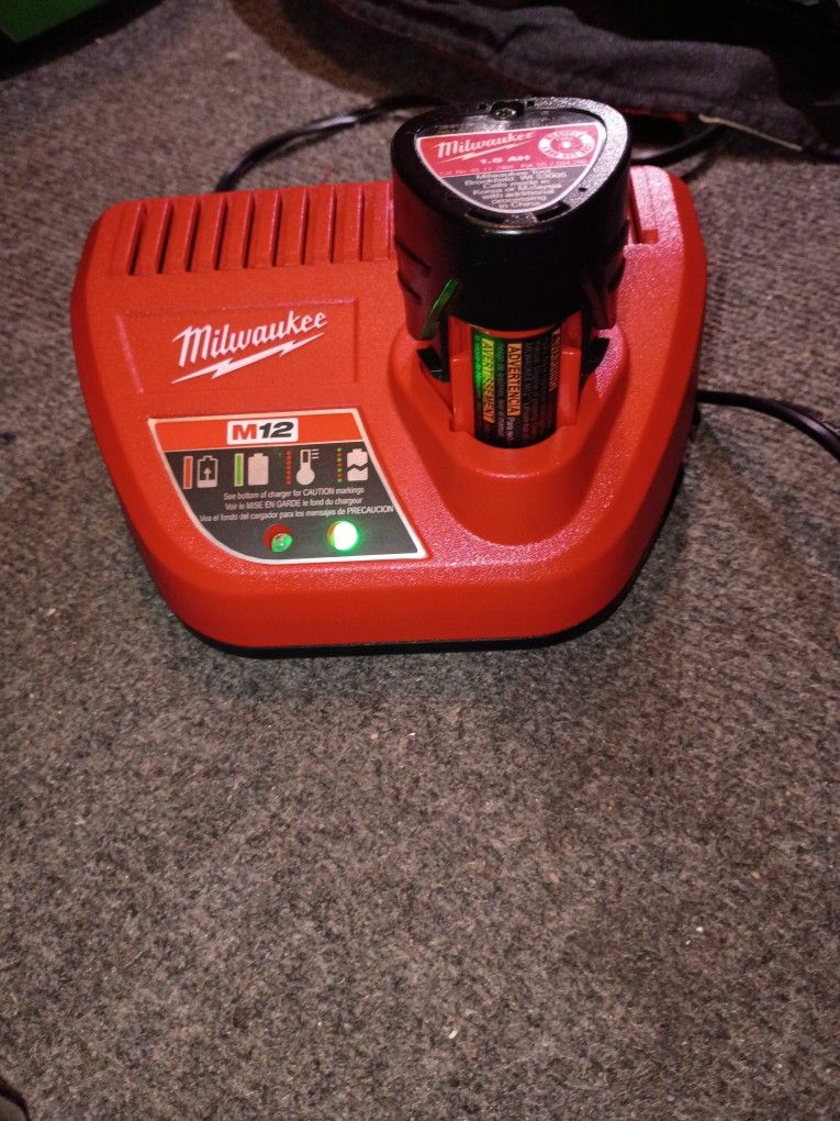 Milwaukee M12 Battery And Charger (New)