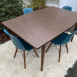 1960s Mid Century Modern Boat Shape Walnut Color Wood And Formica Dining Table 