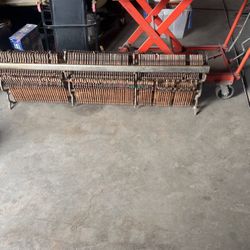 The hammer set up for an old vintage piano to hit the strings