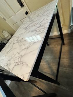 Bar tables converted with marble contact paper