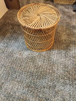 Vintage BoHo chic round wicker rattan table plant stand, stool, or basket.