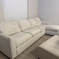 City Furniture light beige couch with ottoman