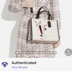 Disney X Coach Dempsey Carryall With Cruella Deville Motif