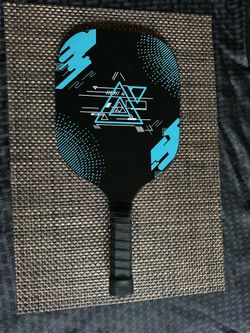 Pickleball paddle and ball