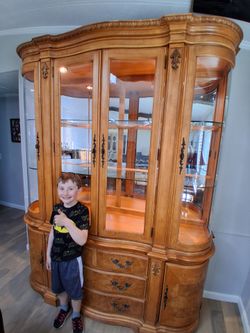 Vintage table and lighted hutch