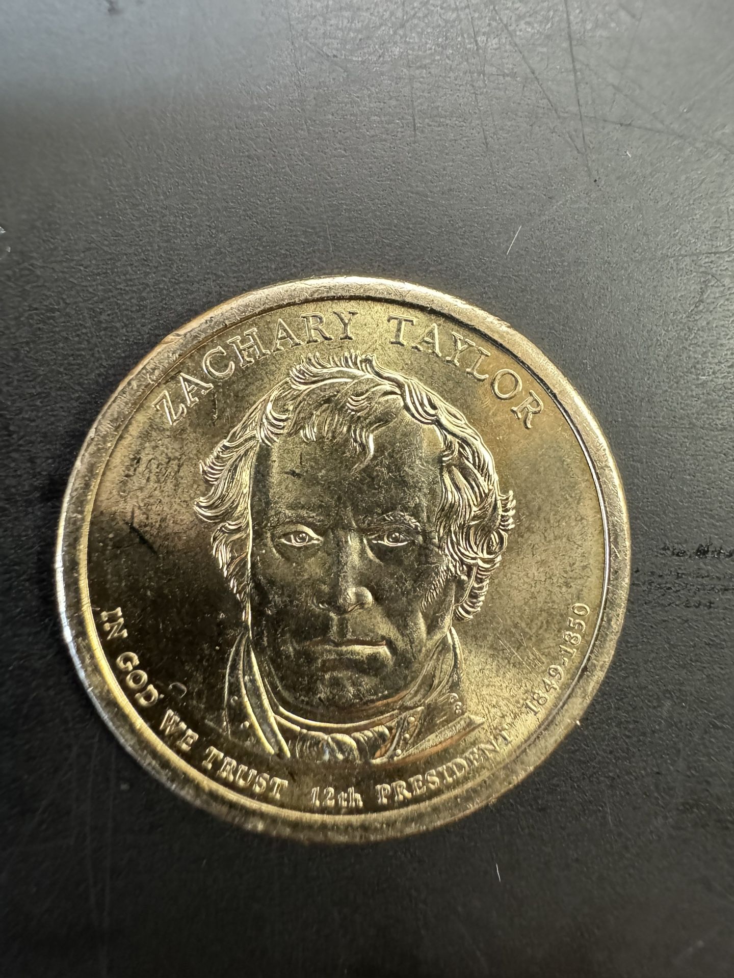 1$ Coin