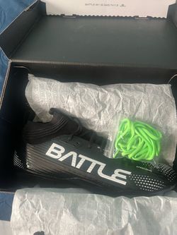 Black battle astrofly football cleats