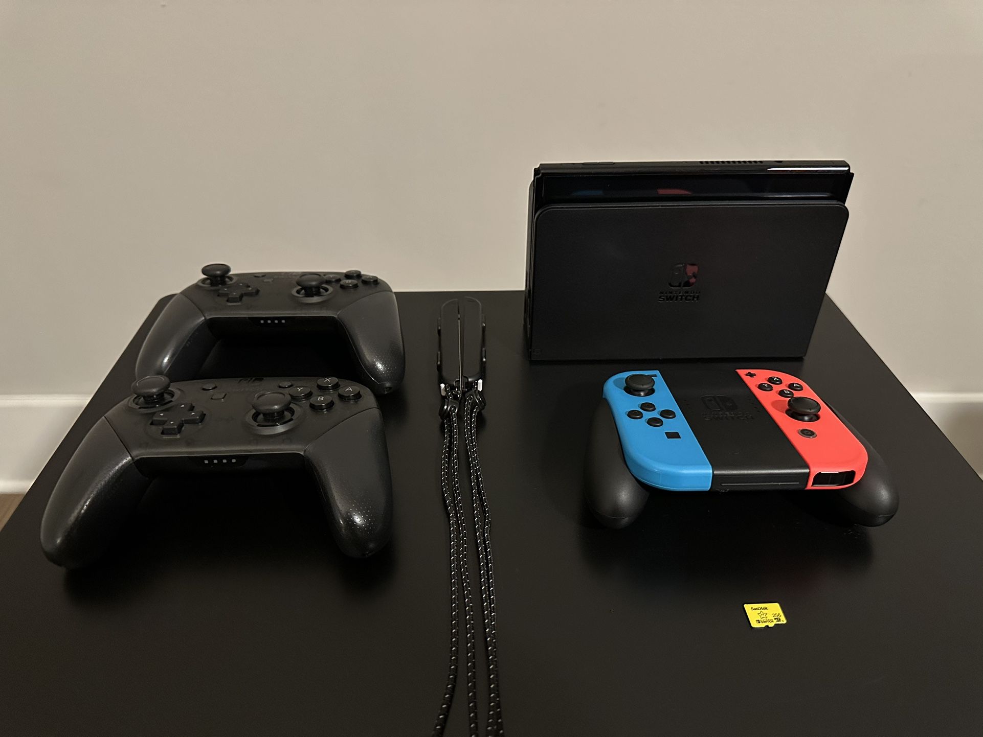 Nintendo Switch OLED + 2 Pro Controllers + 256GB MicroSD – Great Condition!