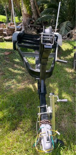 Galvanized dual Axel trailer up to 24’ boat or 7,000lb. New Jack, good wheels. All components are in good condition. No work needed. Ready to load….1