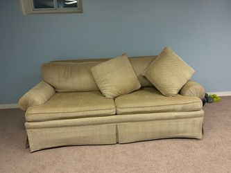 Tan Herringbone Sofa with Throw Pillows