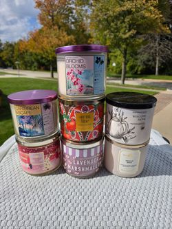 New Bath & Body candles, three wick. Each
