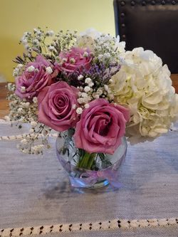 Lilac/Purple Flower Arrangements customizable to your theme and color for any occasion.