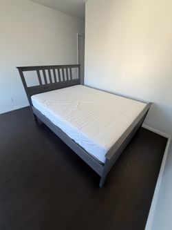 IKEA bed frame ,with clean queen mattress ,first person that brings $200 firm firm for everything take it Costa Mesa