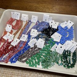 31 strands of Czech glass beads for jewelry making, some glow