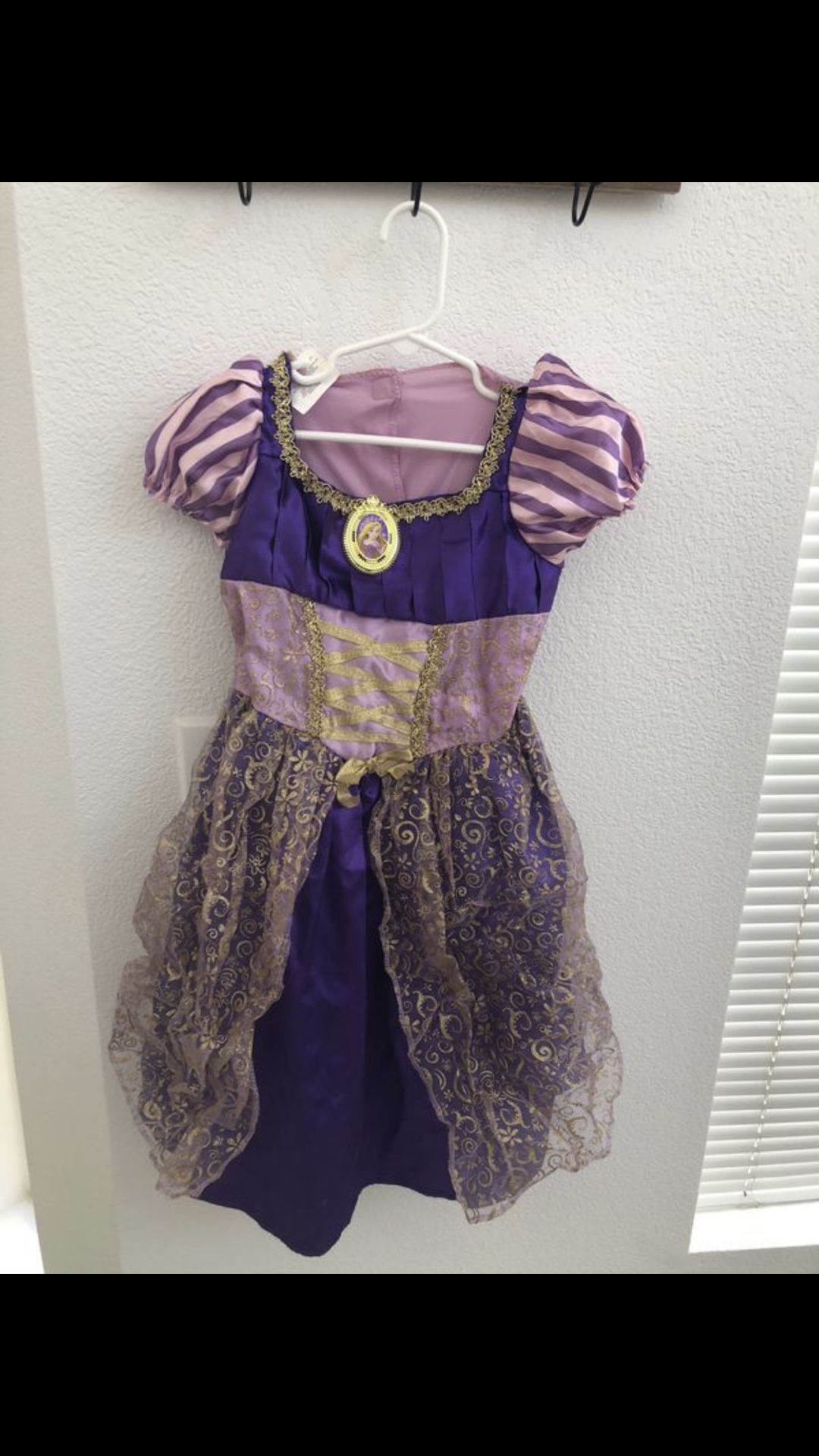 Rapunzel size 4 t