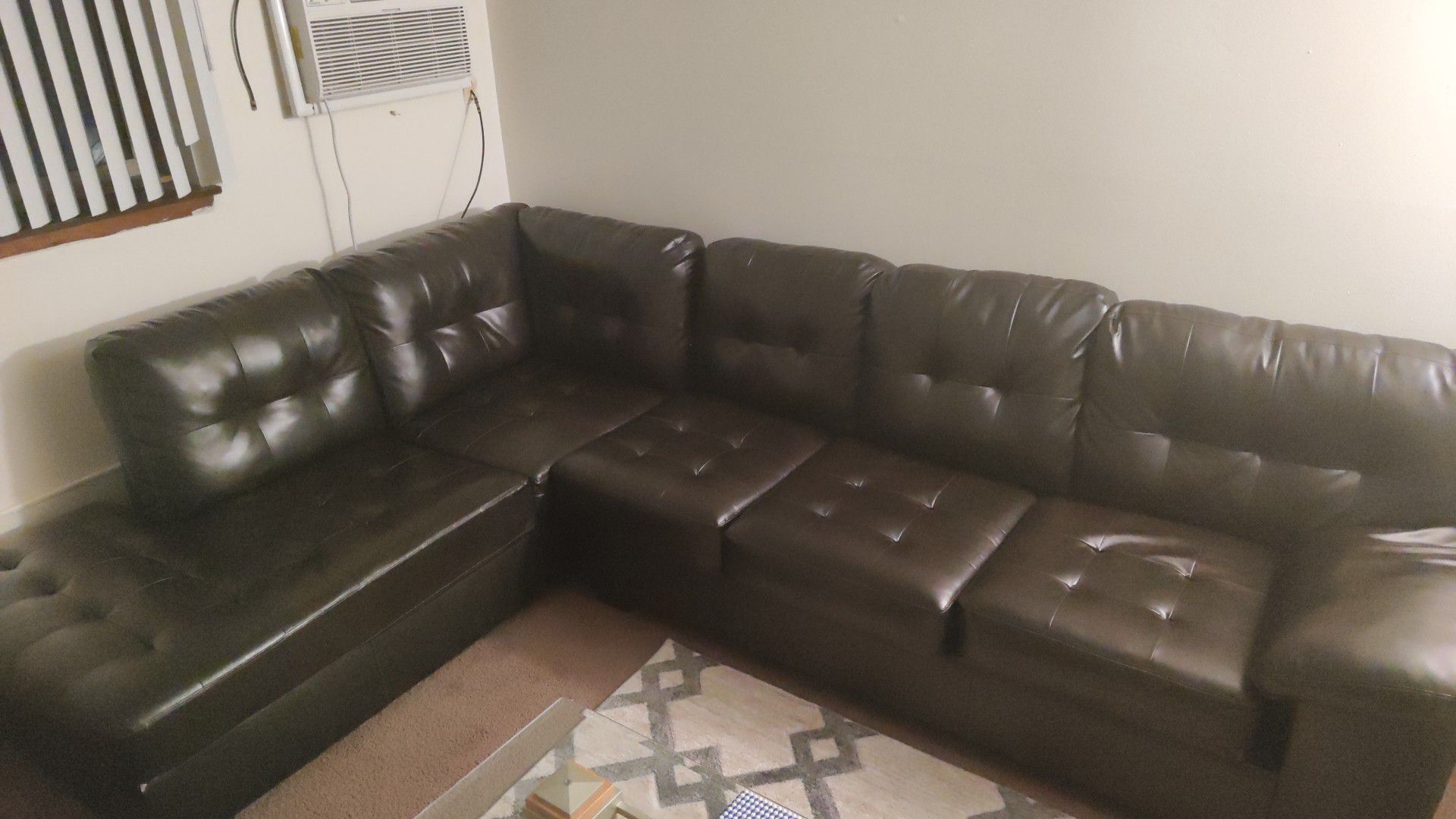 Black sectional couch 2 months only.