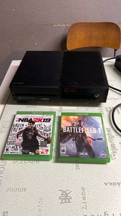 Xbox console with 2 games